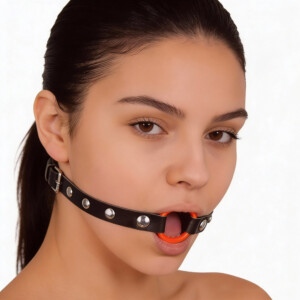 Woman wearing black leather strap with orange ring gag