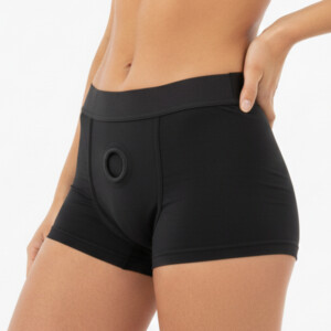 Black swim trunks with circular front feature.