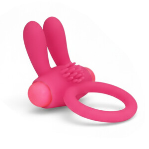 Pink silicone bunny-shaped ring with textured surface.