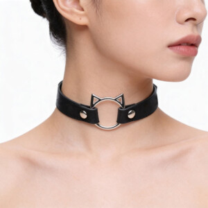 Black cat-themed choker necklace on neck.
