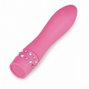 Pink jeweled vibrator on a white background