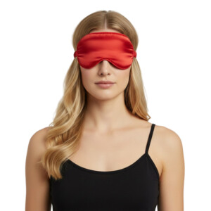 Woman wearing red silk sleep mask