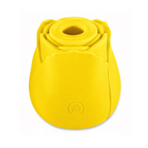 Yellow rose-shaped decorative object on white background