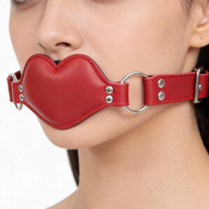 Person wearing red leather gag mask