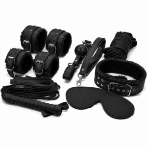 Black leather BDSM restraint set with cuffs and rope