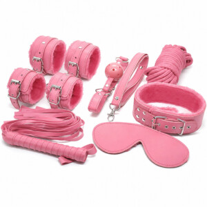 Pink faux leather bondage kit with restraints