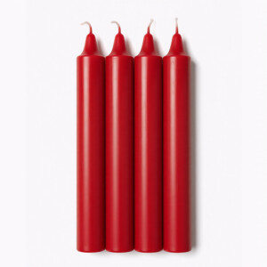 Four red pillar candles in a row.