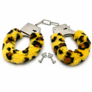 Leopard-print fuzzy handcuffs with keys on white background