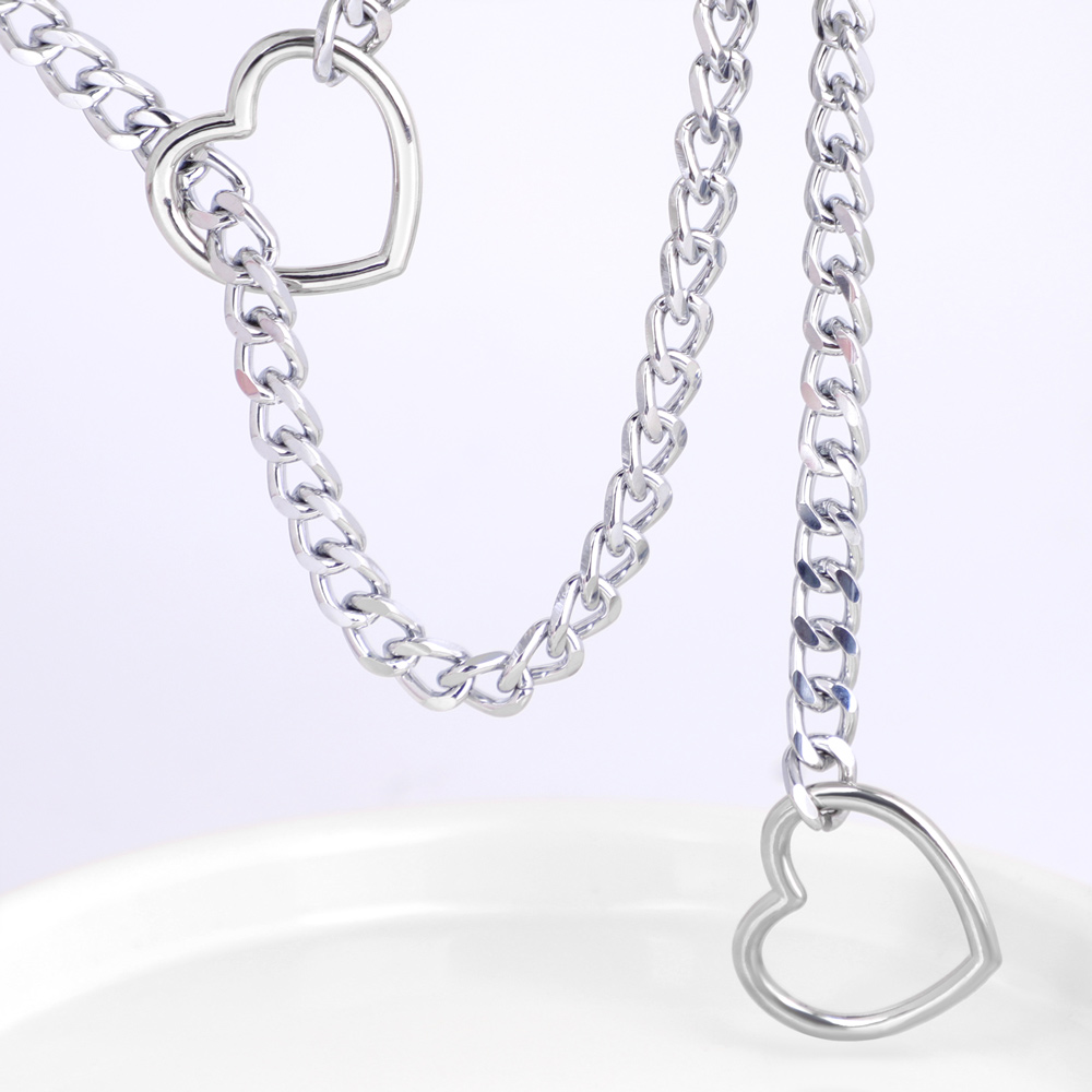 Silver heart chain necklace on display