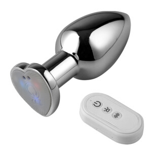 Metal plug with heart base and remote.