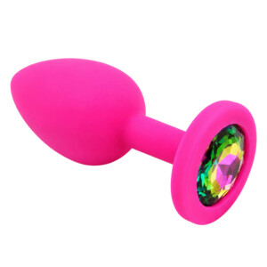Pink silicone jeweled butt plug on white background