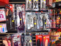 Romantic Depot Manhattan interior featuring adult toy displays with various vibrators, dildos, and pleasure products neatly arranged on shelves.