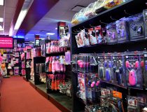 Romantic Depot Manhattan display featuring realistic dildos, strap-ons, and popular adult toys, designed for enhanced sexual pleasure and satisfaction.