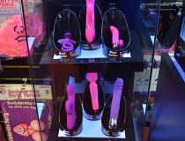 Romantic Depot Manhattan adult toy store shelves featuring dildos, vibrators, and intimacy enhancers