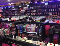 Romantic Depot Manhattan display featuring a variety of adult toys including dildos, vibrators, and bondage accessories