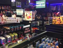 Romantic Depot Manhattan adult toy display featuring dildos, vibrators, and intimacy enhancers for couples