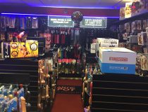 Adult toy section at Romantic Depot Manhattan with dildos, vibrators, and erotic pleasure products on display
