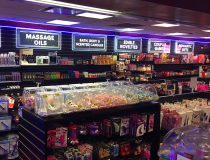 Shelves of adult toys at Romantic Depot Manhattan featuring dildos, vibrators, and couple’s intimacy products