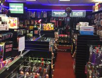 Adult toy aisle at Romantic Depot Manhattan displaying vibrators, dildos, and other intimacy products