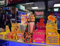 Wall of adult toys at Romantic Depot Manhattan featuring dildos, vibrators, and pleasure products for couples