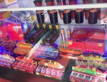 Romantic Depot Manhattan interior view featuring shelves stocked with adult toys, including vibrators, dildos, and personal lubricants, organized by category for customer browsing.