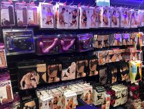 Lingerie display at Romantic Depot Manhattan showcasing sexy outfits, lace teddies, and intimate clothing