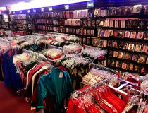 Romantic Depot Manhattan lingerie display with sexy outfits, lace bodysuits, and intimate accessories