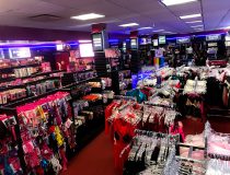 Lingerie section at Romantic Depot Manhattan displaying lace bras, sexy teddies, and intimate wear