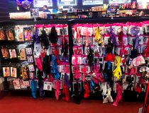 Lingerie display at Romantic Depot Manhattan featuring sexy bras, lace outfits, and intimate clothing