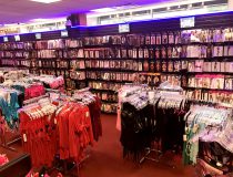 Sexy lingerie and intimate wear display at Romantic Depot Manhattan, including lace bodysuits and teddies