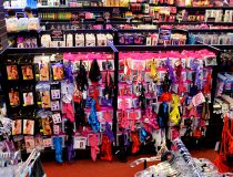 Lingerie section at Romantic Depot Manhattan showcasing sexy bodysuits, lace teddies, and intimate clothing