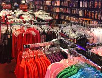 Romantic Depot Manhattan lingerie wall with sexy outfits, lace bodysuits, and intimate accessories