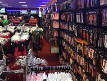 Intimate apparel display at Romantic Depot Manhattan featuring sexy lingerie, corsets, and lace outfits