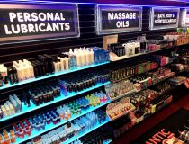 Romantic Depot Manhattan lube and lotion display featuring anal lube, flavored lube, and personal lubricants for enhanced pleasure.