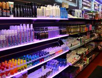 Selection of personal lubricants and intimacy lotions at Romantic Depot Manhattan, featuring silicone-based lube, water-based lube, and flavored massage oils.