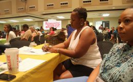 Women attending Romantic Depot educational event, taking notes at classroom-style workshop