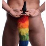 Rainbow fox tail anal plug for pride roleplay, silicone butt plug with colorful faux fur tail, available at Romantic Depot NYC
