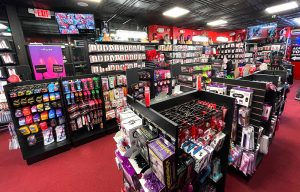 St. Patrick’s Day sale banner at Romantic Depot featuring 50% off promotions on adult toys and lingerie.