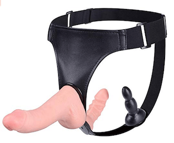 Adjustable strap-on harness with realistic dildo and anal plug attachment, ideal for couples play and pegging.