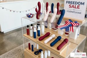 Red, white, and blue sex toys arranged for a Fourth of July sale